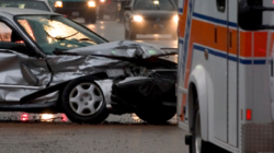 severe car crash and ambulance
